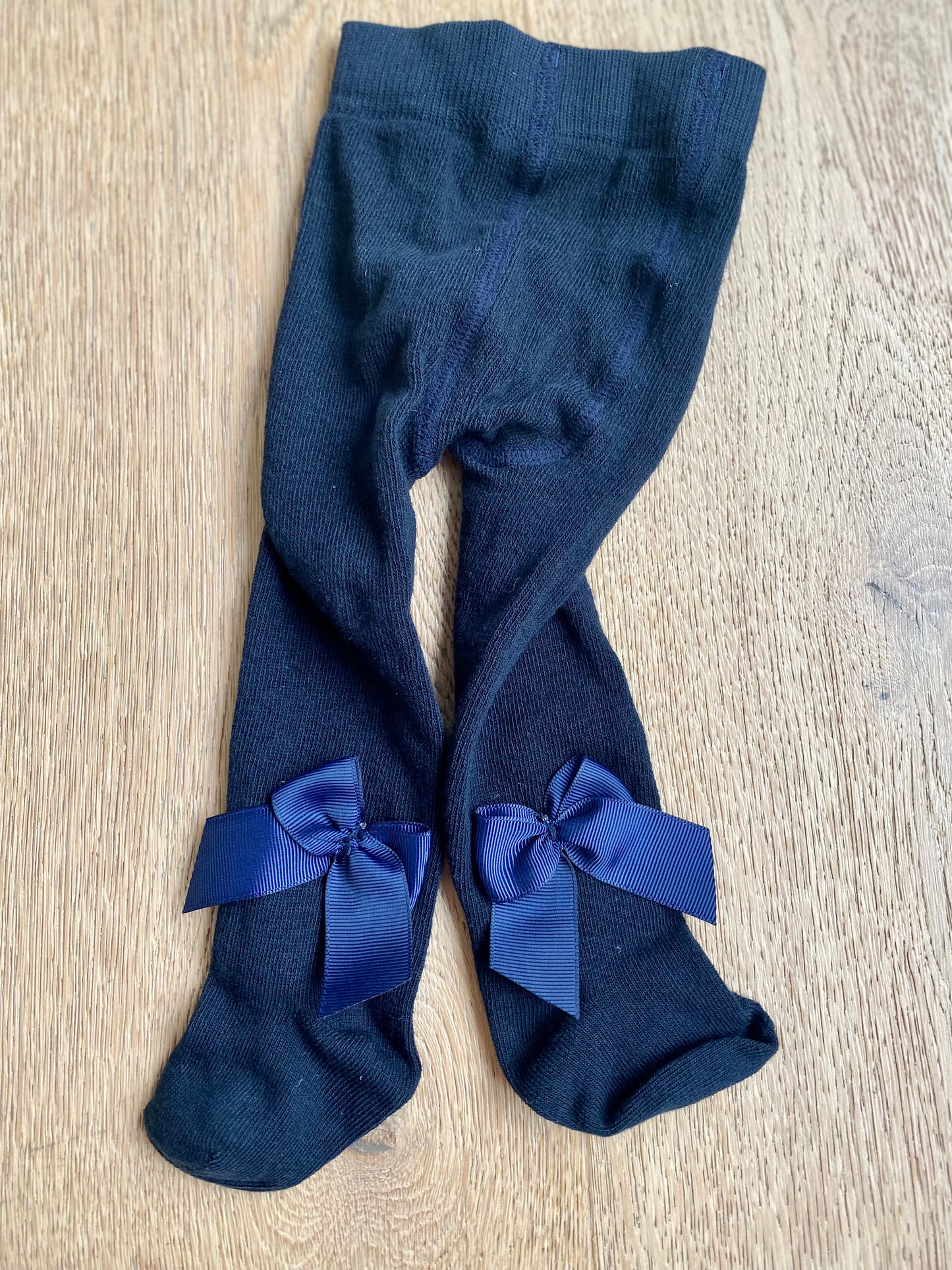 Marineblauwe kousenbroek met strik