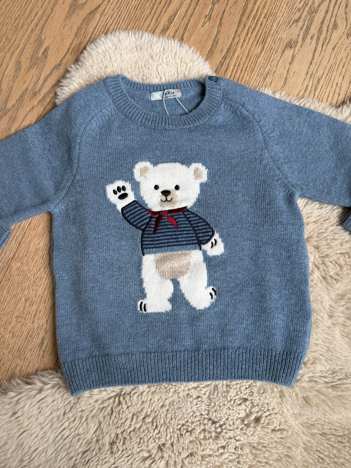 Lichtblauwe wollen pull met beer - dr. Kid