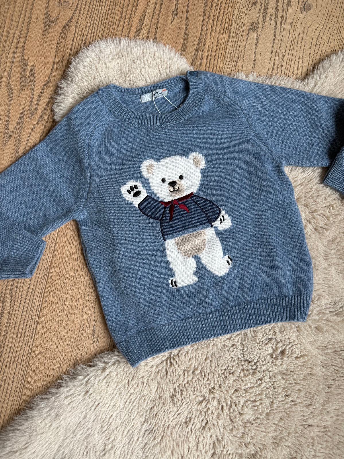 Lichtblauwe wollen pull met beer - dr. Kid